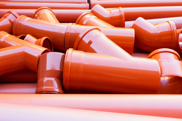 Bunch of bright red pvc sewer pipes