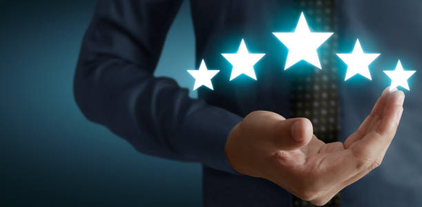 istock Rise on increasing five stars in human hand, Increase rating evaluation and classification concept 1284731078