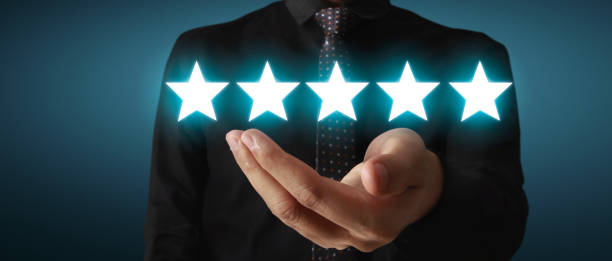 istock Rise on increasing five stars in human hand, Increase rating evaluation and classification concept 1284731085