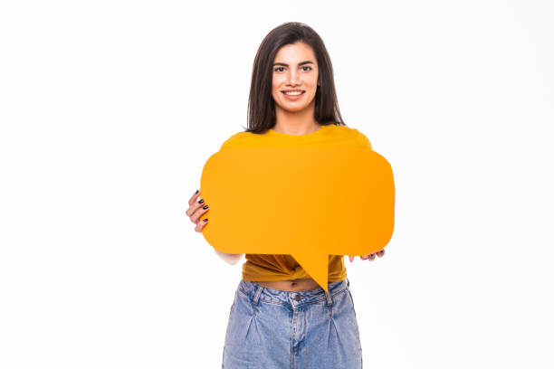 istock Young woman with speech bubble isolated on white background 1284732025