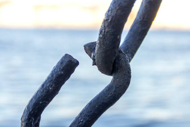 istock The broken link of an old rusty chain. 1284732450