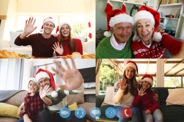 cuatro pantallas que muestran a la gente que usa sombreros de santa que tienen video chat interactuando con amigos - santa claus waving christmas photography fotografías e imágenes de stock