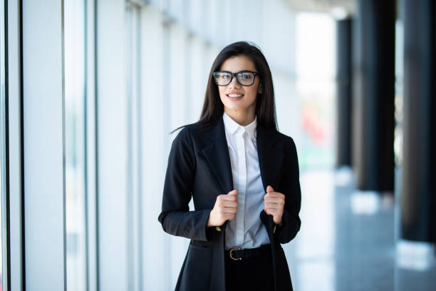 istock Modern business woman in the modern office with copy space 1284736715