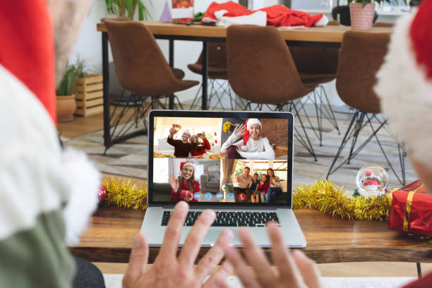 istock Caucasian couple at christmas on a video call 1284741595