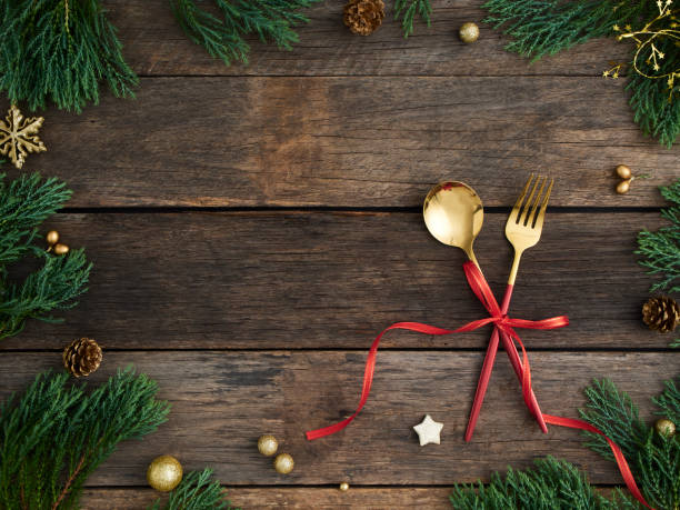 istock Christmas table setting on rustic wooden background. Holidays background 1284742366