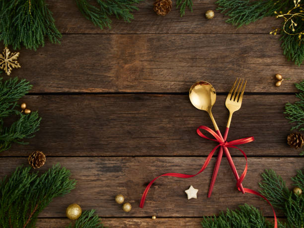 istock Christmas table setting on rustic wooden background. Holidays background 1284742419