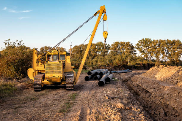istock Crawler crane and gas pipes 1284742475