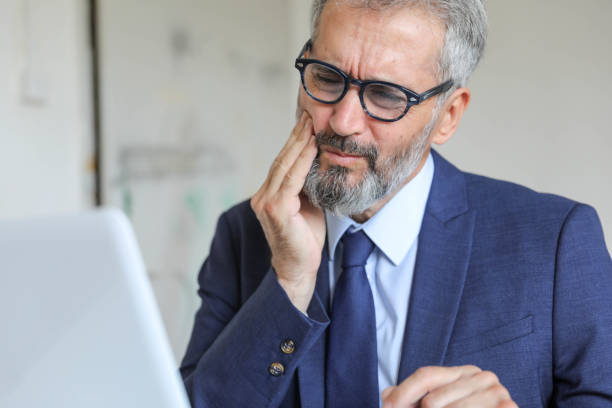 istock Businessman working on laptops at the office 1284743432