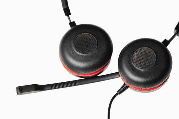 istock Black headphones with microphone. Distance education and remote work concept. Isolate. 1284743925