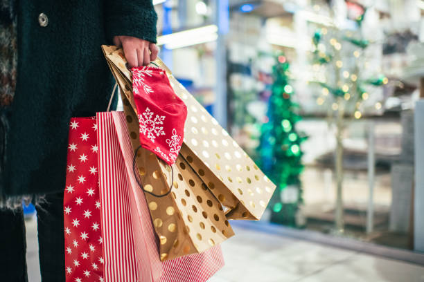 istock Christmas shopping with protective mask during COVID-19 1284744139