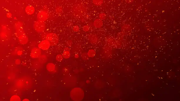 Photo of gold particles abstract background with shining golden Floating Dust Particles Flare Bokeh star on red Background. Futuristic glittering in space.