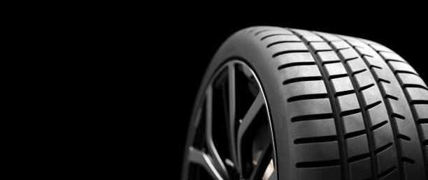 istock Wheel with modern alu rims on black 1284747197