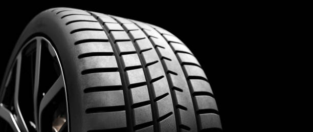 istock Wheel with modern alu rims on black 1284747202