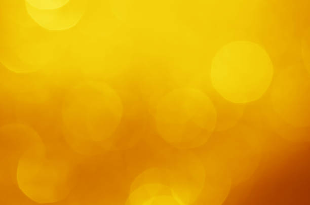 istock glitter light sparkle yellow golden gorgeous bokeh defocused abstract background shiny. 1284748905