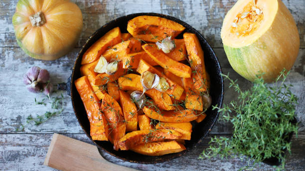 istock Baked pumpkin with herbs and garlic. 1284749615