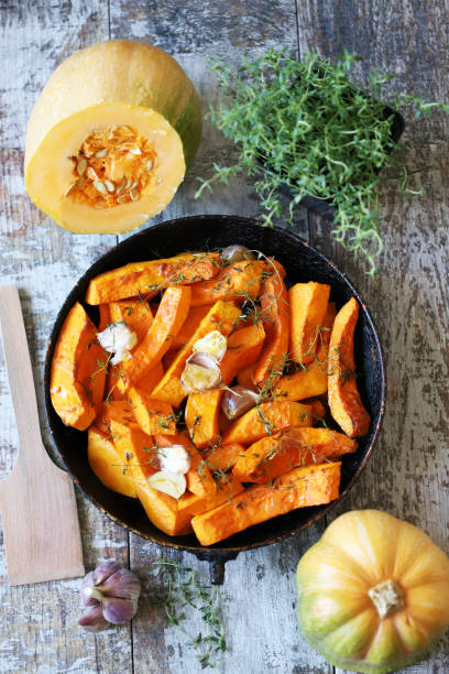 istock Baked pumpkin with herbs and garlic. 1284749623
