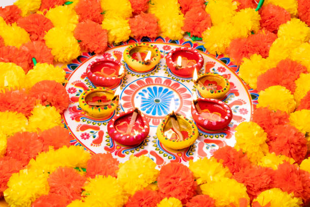 istock Clay Diya  or lamp with rangoli  stock image. 1284754068