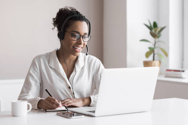 istock Woman working from home. Student girl studying online 1284755317