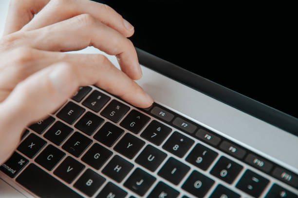 istock close up. man using the optional touch panel of his laptop 1284758046