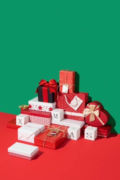 istock Christmas  Gift Arrangement on Green and Red Background 1284761867