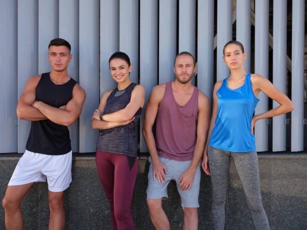 istock Young caucasian people in sportswear looking at camera 1284762138