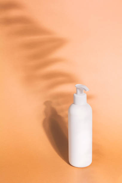 istock White pump plastic bottle mockup on beige background 1284762793