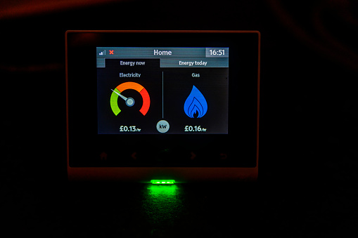 Smart meter fitted in the kitchen of a UK home to enable efficient monitoring of energy usage.