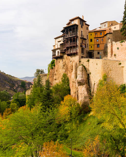 Casas colgadas (hanged houses) on a hill during an autumn day in Cuenca, Spain