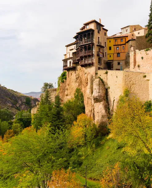 Casas colgadas (hanged houses) on a hill during an autumn day in Cuenca, Spain