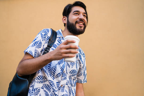 istock Man enjoying summer and wearing summer clothes. 1284770112