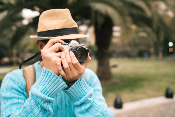 istock Asian tourist with a vintage camera. 1284770698