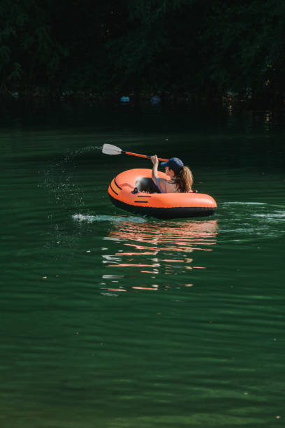 istock Young woman rowing 1284771889
