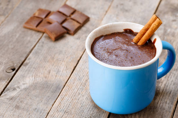 istock cup of hot chocolate with cinnamon stick 1284771999