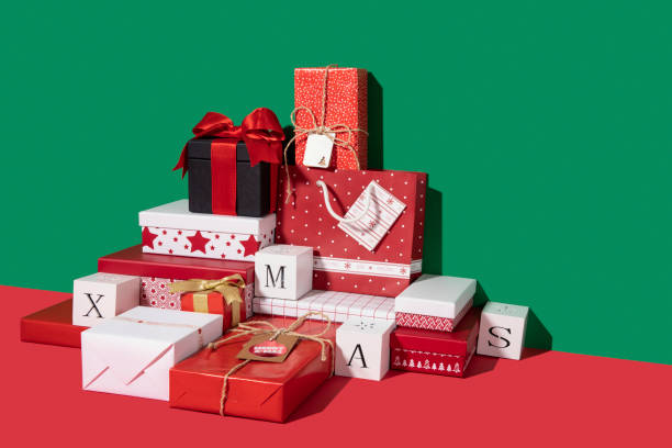 istock Christmas  Gift Boxes on Green and Red Background 1284773236