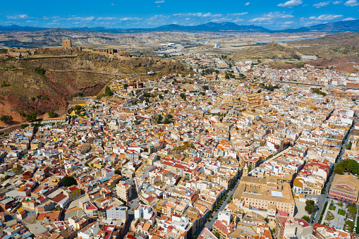 Aerial view of Spanish city of Lorca overlooking Collegiate church of St. Patrick on sunny autumn day