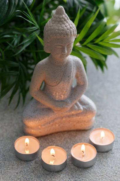 istock Natural stone statue of Buddha 1284777433