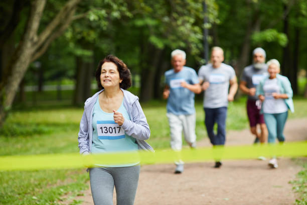 istock Woman Running Marathon First 1284779184
