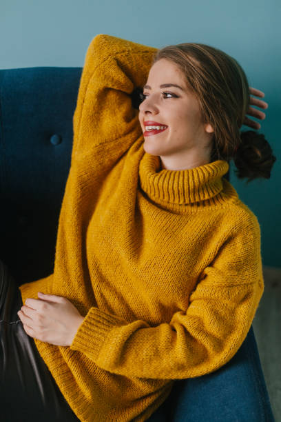istock Young woman smiling and relaxing 1284780101