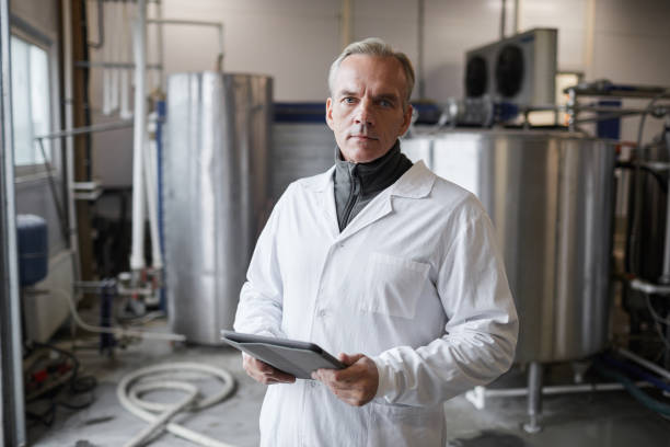 istock Mature Worker at Food Factory 1284780134