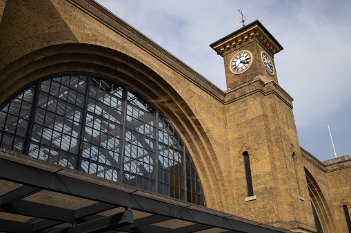 Facade of King Cross station with the clock tower
