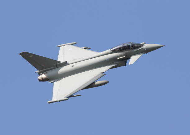 Eurofighter Typhoon RAF Eurofighter Typhoon FGR.4 ZK436 breaking into the circuit to land runway 07 RAF Coningsby typhoon stock pictures, royalty-free photos & images