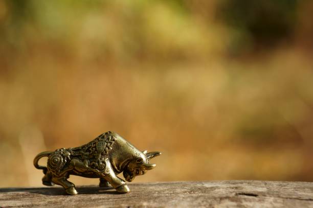 istock Metal bull figurine close-up. 1284782450