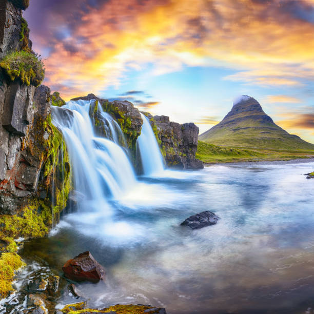 istock Fantastic view on Kirkjufellsfoss waterfall  near Kirkjufell mountain at sunset. 1284784082