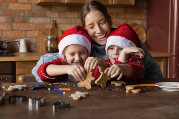 istock Loving mom have fun baking biscuits with kids 1284784121