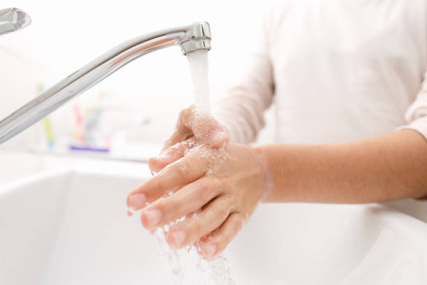 istock Washing hands in the bathroom. 1284784768