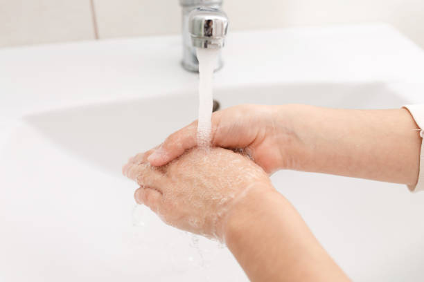 istock Washing hands in the bathroom. 1284785276