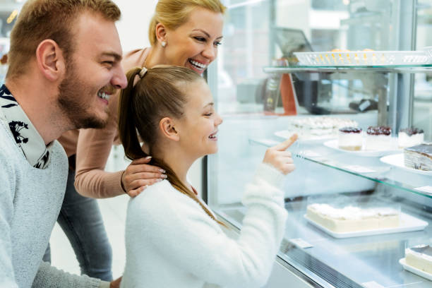 istock Family Buying Sweets 1284785924