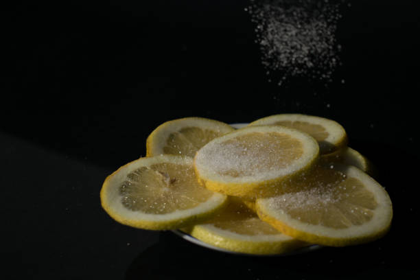 istock lemon slices with sugar being poured 1284787279