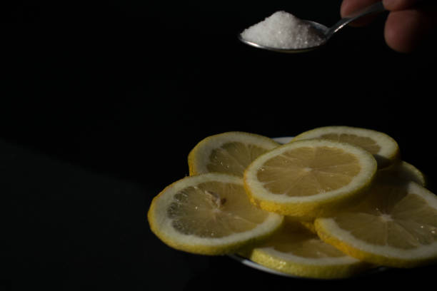 istock lemon slices with sugar being poured 1284787292