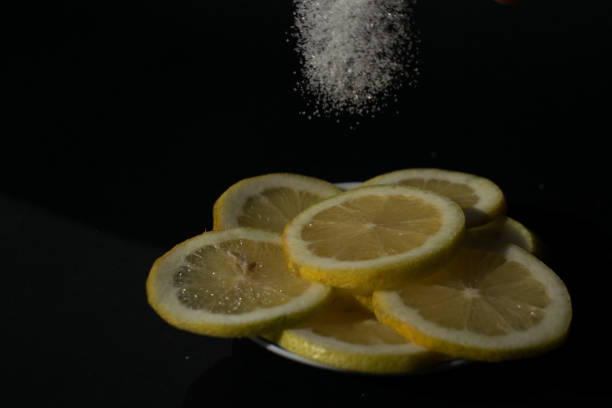 istock lemon slices with sugar being poured 1284787294